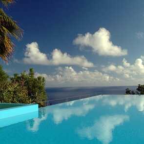 Pool mit Meerblick im Estalagem Ponta do Sol